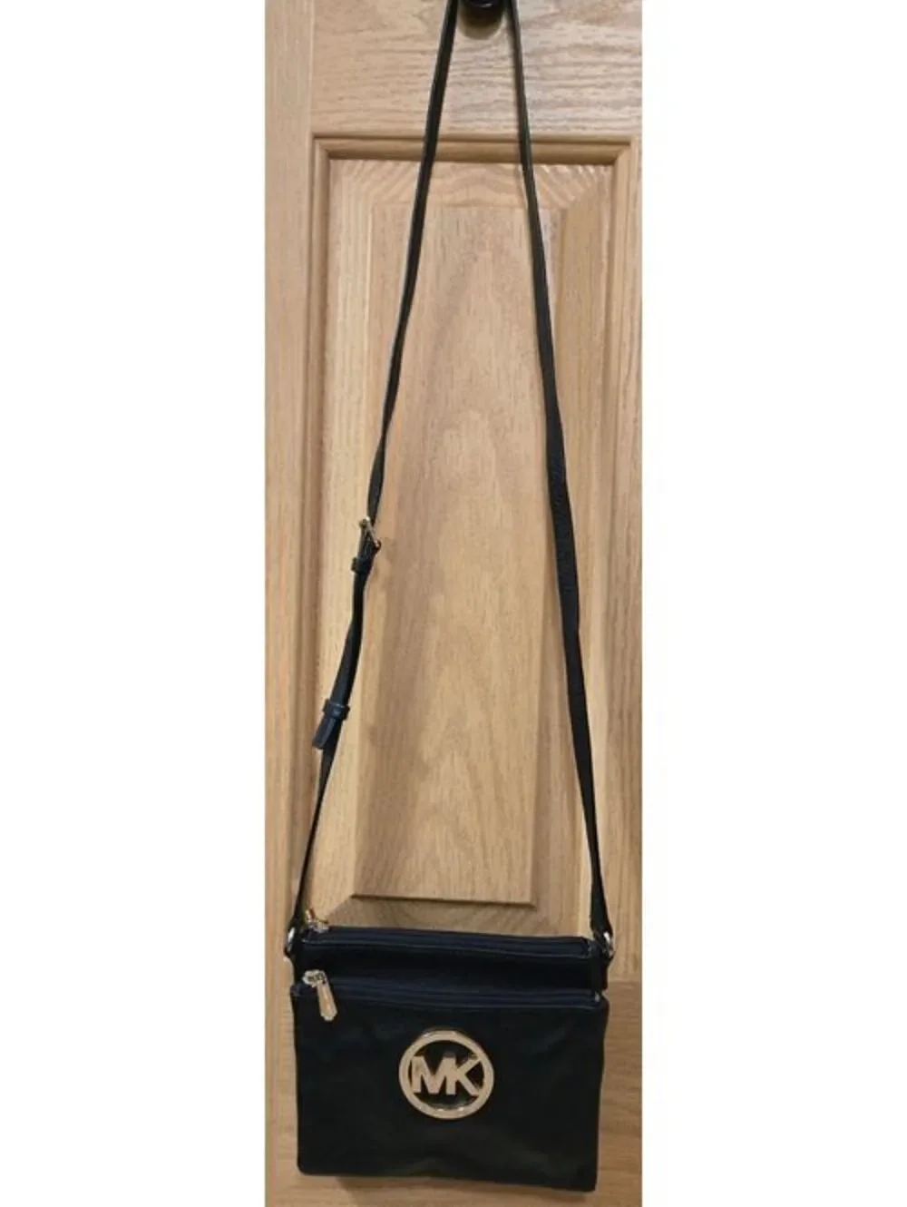 Michael Kors Black Leather Crossbody Bag with Gold Logo and Adjustable Strap